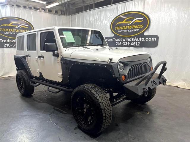 used 2013 Jeep Wrangler Unlimited car, priced at $17,795