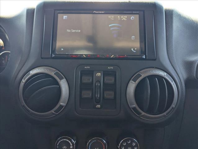 used 2015 Jeep Wrangler Unlimited car, priced at $16,499