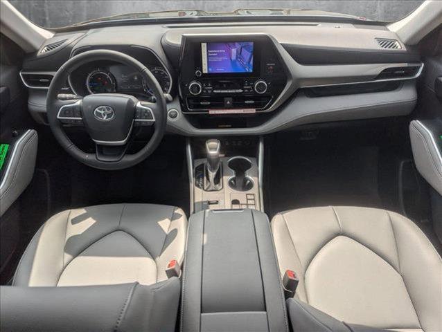 used 2025 Toyota Highlander Hybrid car, priced at $49,995