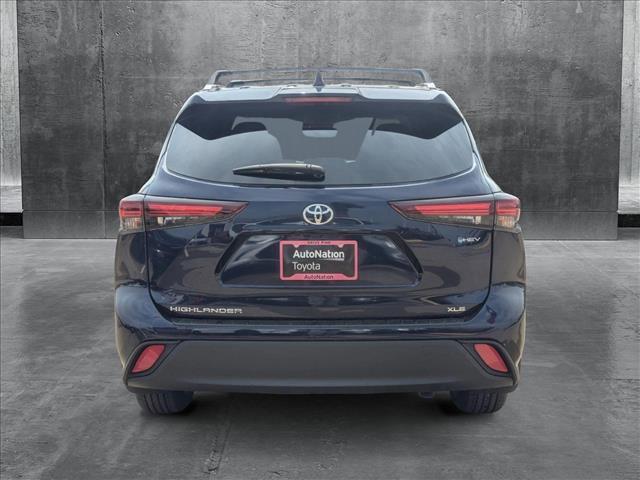 used 2025 Toyota Highlander Hybrid car, priced at $49,995