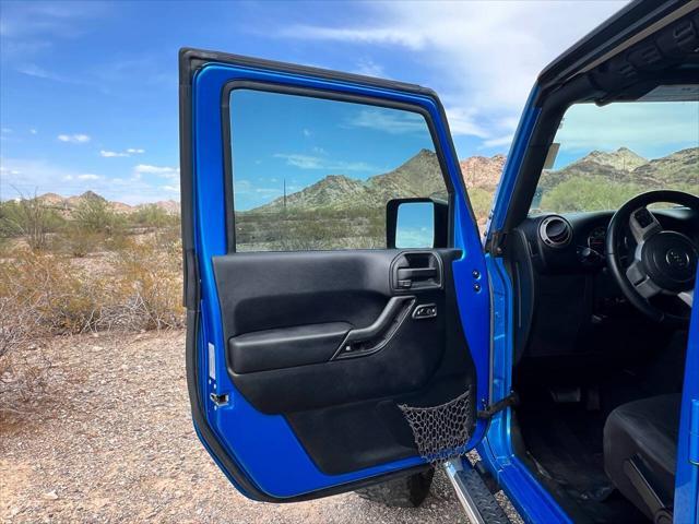 used 2015 Jeep Wrangler Unlimited car, priced at $18,500