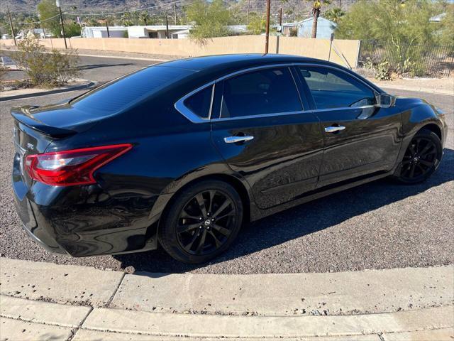 used 2017 Nissan Altima car, priced at $9,500