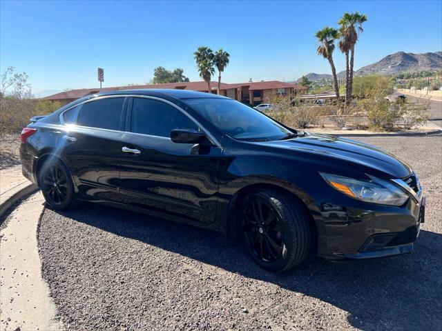 used 2017 Nissan Altima car, priced at $9,500