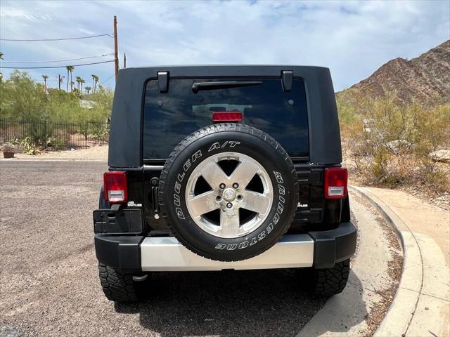 used 2009 Jeep Wrangler Unlimited car, priced at $15,900