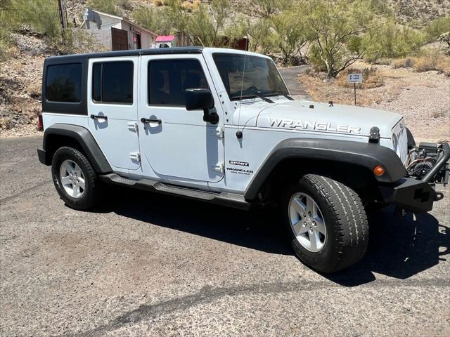 used 2015 Jeep Wrangler Unlimited car, priced at $18,900