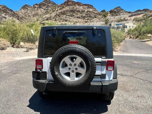 used 2015 Jeep Wrangler Unlimited car, priced at $18,900