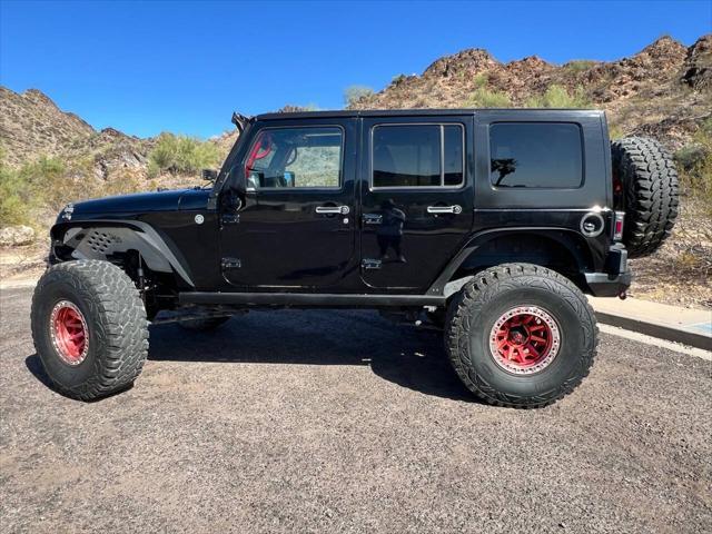 used 2013 Jeep Wrangler Unlimited car, priced at $18,900