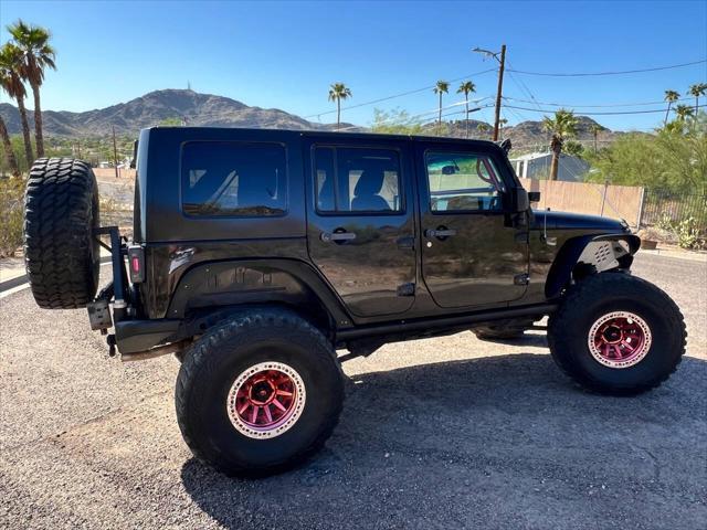 used 2013 Jeep Wrangler Unlimited car, priced at $18,900