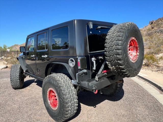 used 2013 Jeep Wrangler Unlimited car, priced at $18,900