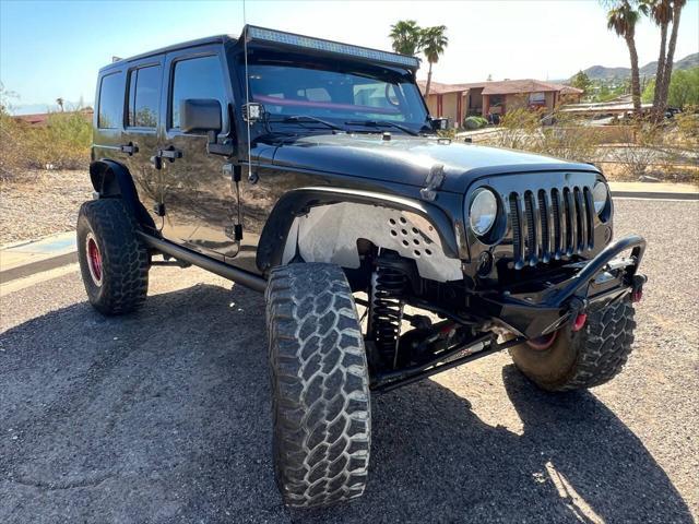 used 2013 Jeep Wrangler Unlimited car, priced at $18,900