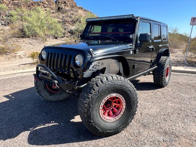 used 2013 Jeep Wrangler Unlimited car, priced at $18,900