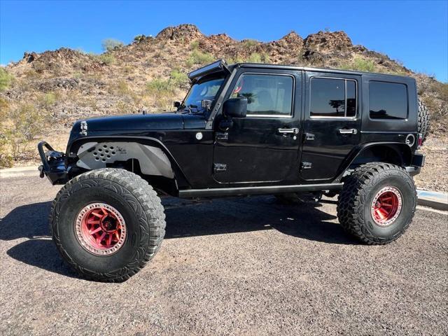 used 2013 Jeep Wrangler Unlimited car, priced at $18,900