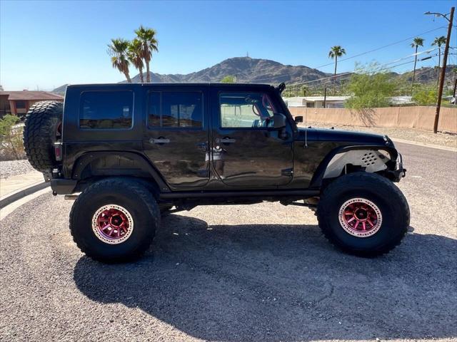 used 2013 Jeep Wrangler Unlimited car, priced at $18,900