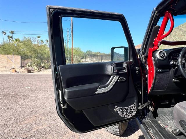 used 2013 Jeep Wrangler Unlimited car, priced at $18,900