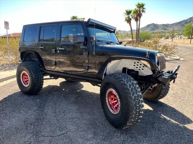 used 2013 Jeep Wrangler Unlimited car, priced at $18,900