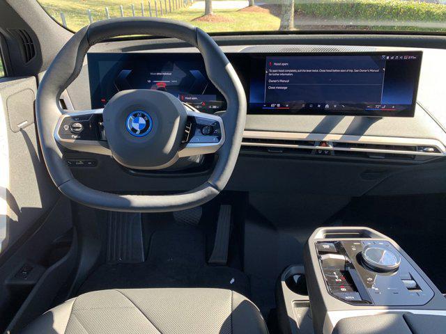 new 2025 BMW iX car, priced at $94,275