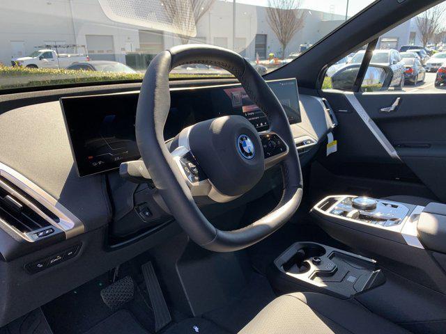 new 2025 BMW iX car, priced at $94,275