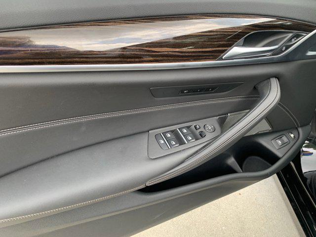 used 2023 BMW 530e car, priced at $33,477