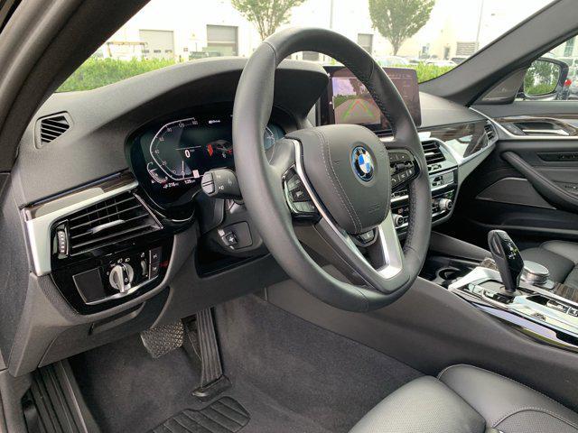 used 2023 BMW 530e car, priced at $33,477