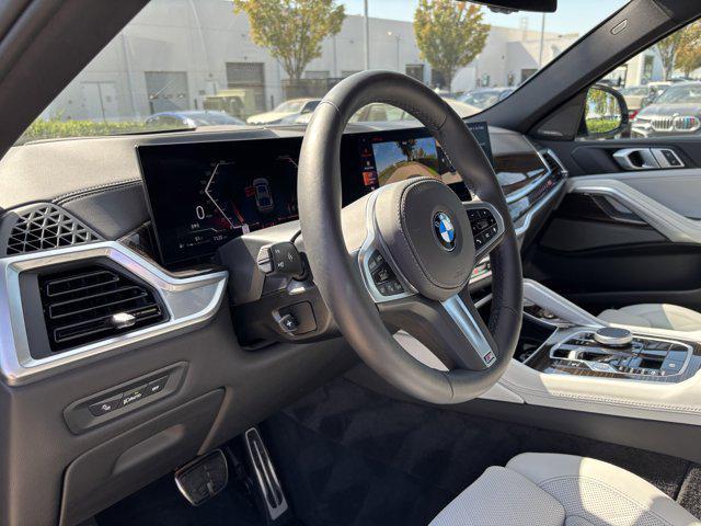 used 2025 BMW X6 car, priced at $69,977