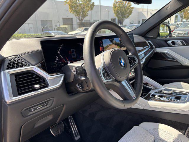 used 2025 BMW X6 car, priced at $69,977