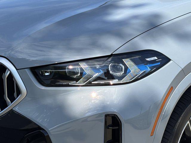used 2025 BMW X6 car, priced at $69,977