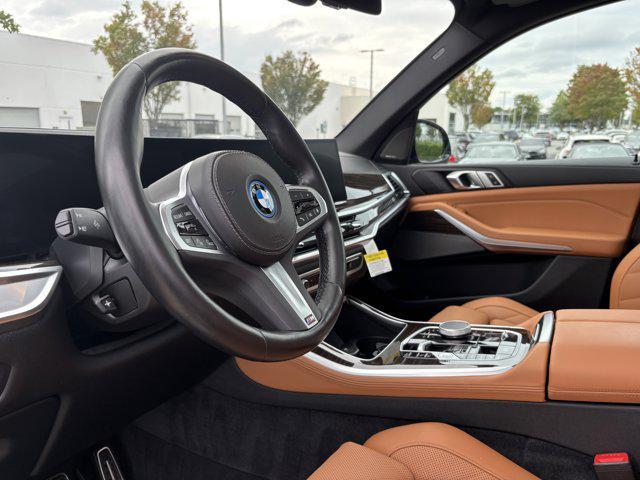 used 2024 BMW X5 PHEV car, priced at $64,477
