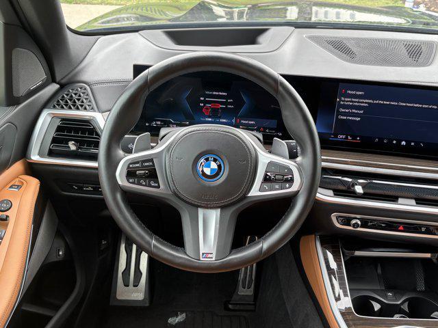used 2024 BMW X5 PHEV car, priced at $64,477