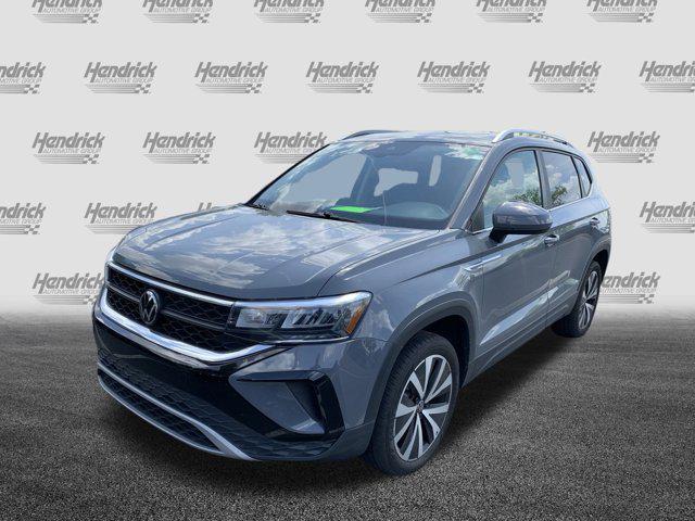 used 2023 Volkswagen Taos car, priced at $24,477