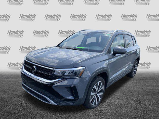 used 2023 Volkswagen Taos car, priced at $24,477