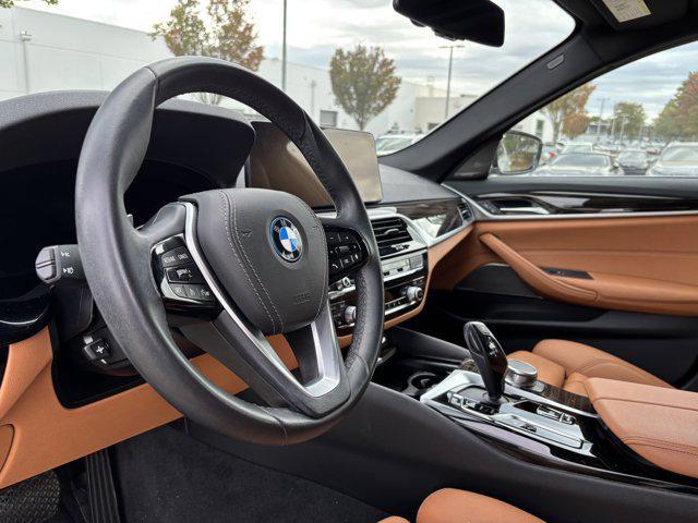 used 2023 BMW 530e car, priced at $37,977