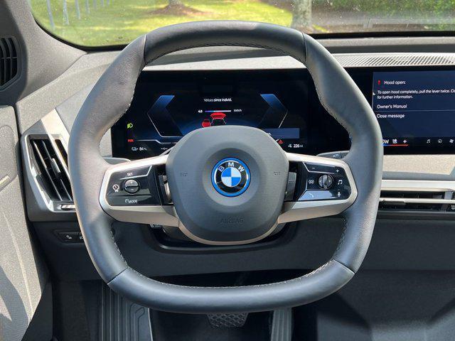 new 2025 BMW iX car, priced at $96,070