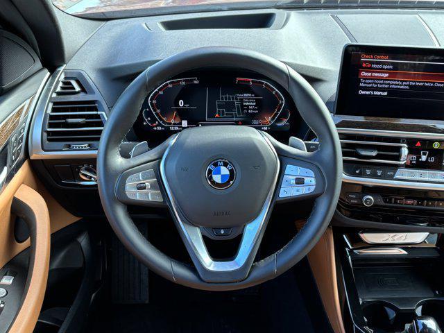 used 2025 BMW X4 car, priced at $47,977