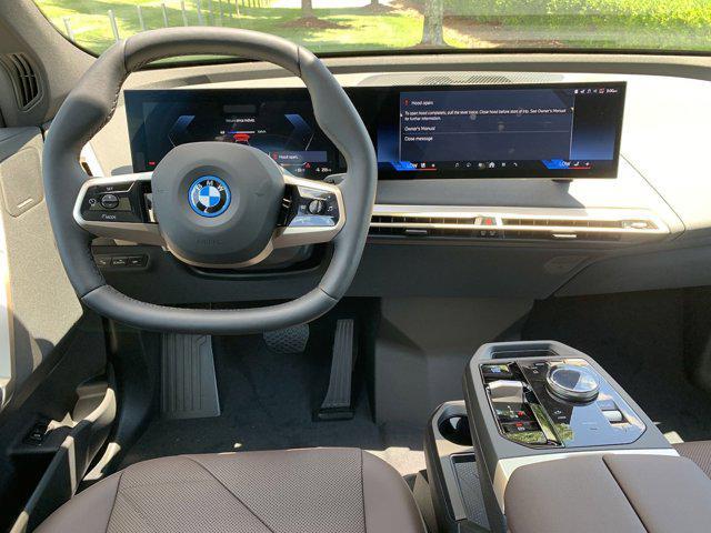 new 2025 BMW iX car, priced at $98,045