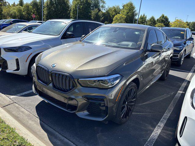 used 2023 BMW X6 car, priced at $54,977