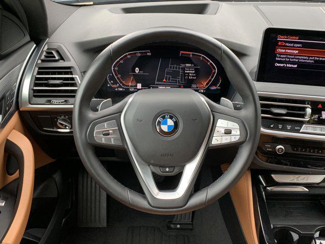 used 2024 BMW X4 car, priced at $48,977