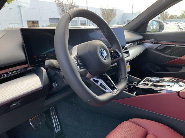 used 2025 BMW i5 car, priced at $75,915