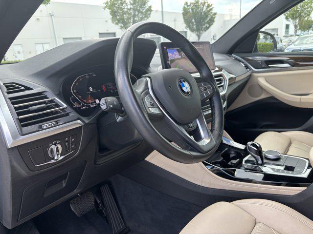 used 2023 BMW X4 car, priced at $43,477