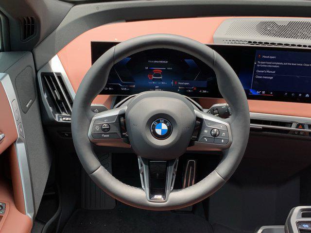 new 2026 BMW iX car, priced at $92,325