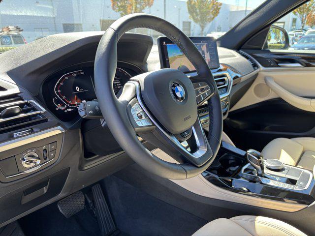 used 2025 BMW X4 car, priced at $49,977