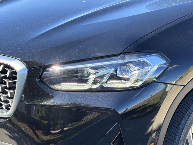 used 2025 BMW X4 car, priced at $49,977