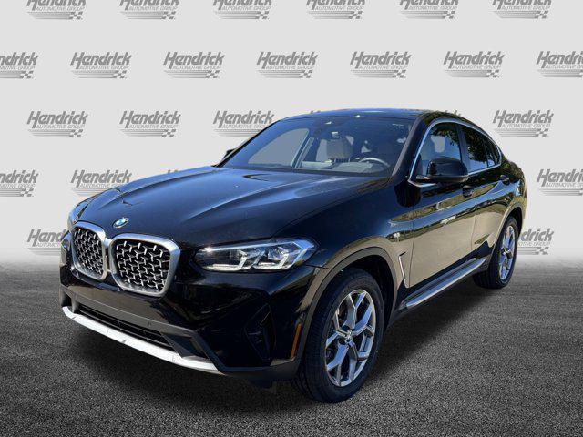 used 2025 BMW X4 car, priced at $49,977