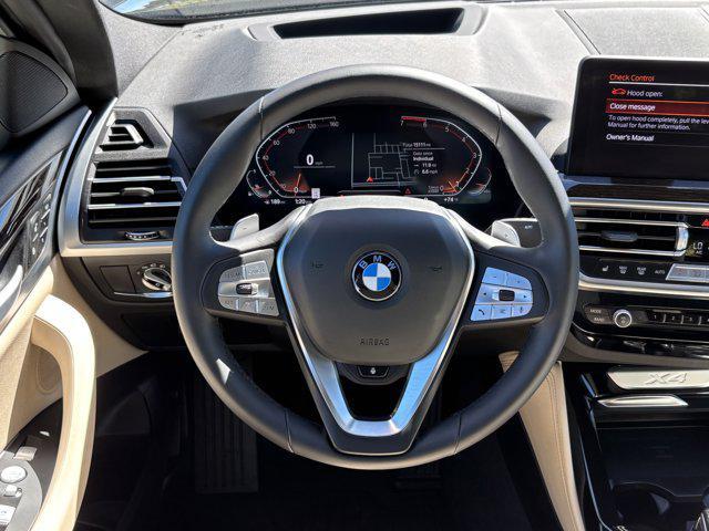used 2025 BMW X4 car, priced at $49,977
