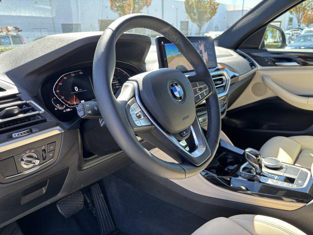used 2025 BMW X4 car, priced at $49,977