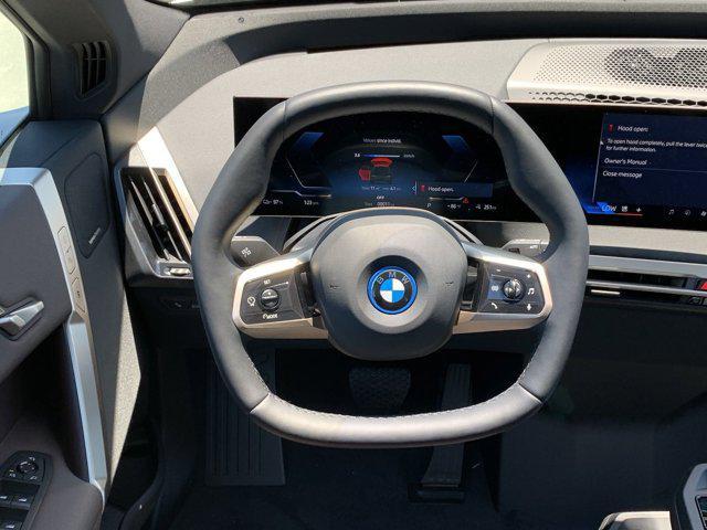 new 2025 BMW iX car, priced at $96,070