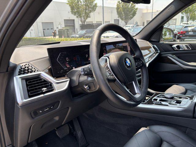 used 2025 BMW X5 car, priced at $67,477