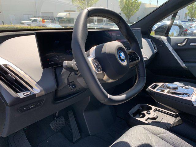 new 2025 BMW iX car, priced at $103,225
