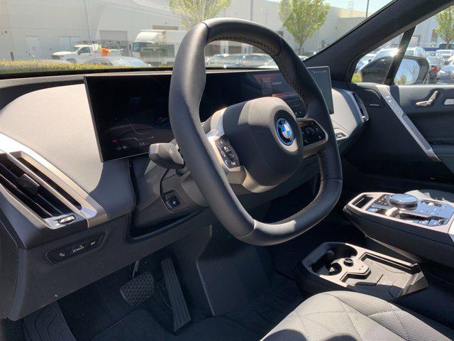 new 2025 BMW iX car, priced at $103,225