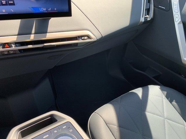 new 2025 BMW iX car, priced at $103,225