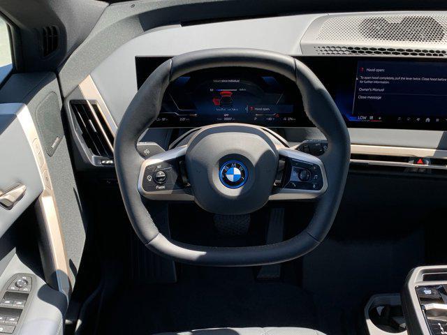 new 2025 BMW iX car, priced at $103,225